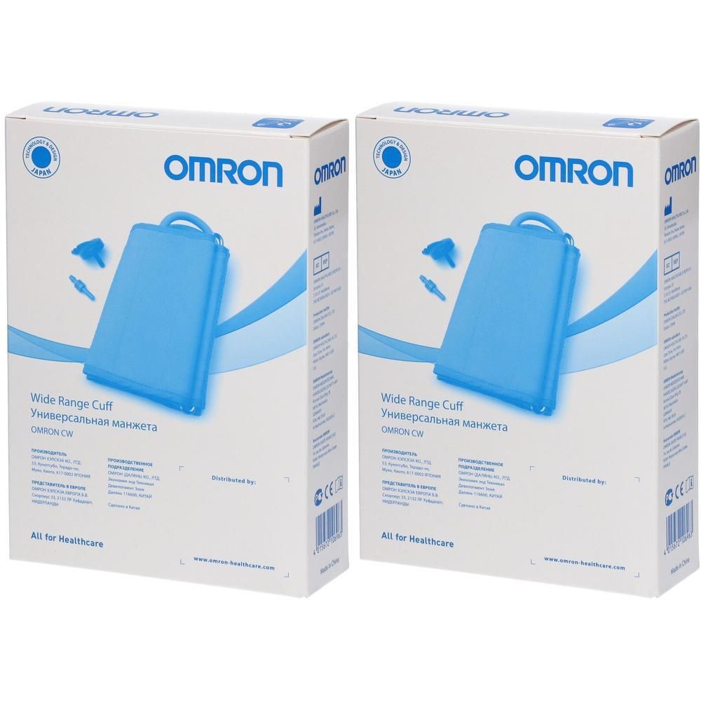 Twee Omron Wide Range Cuff verpakkingen. Blauwe manchet met handvat en connectoren afgebeeld.
