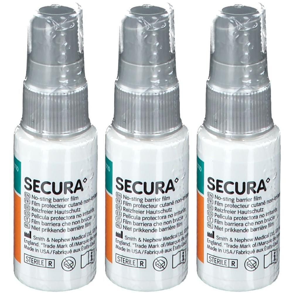 Trois flacons de film barrière Secura No-Sting avec applicateur spray. Flacons blancs avec bouchon argenté et capuchon transparent.