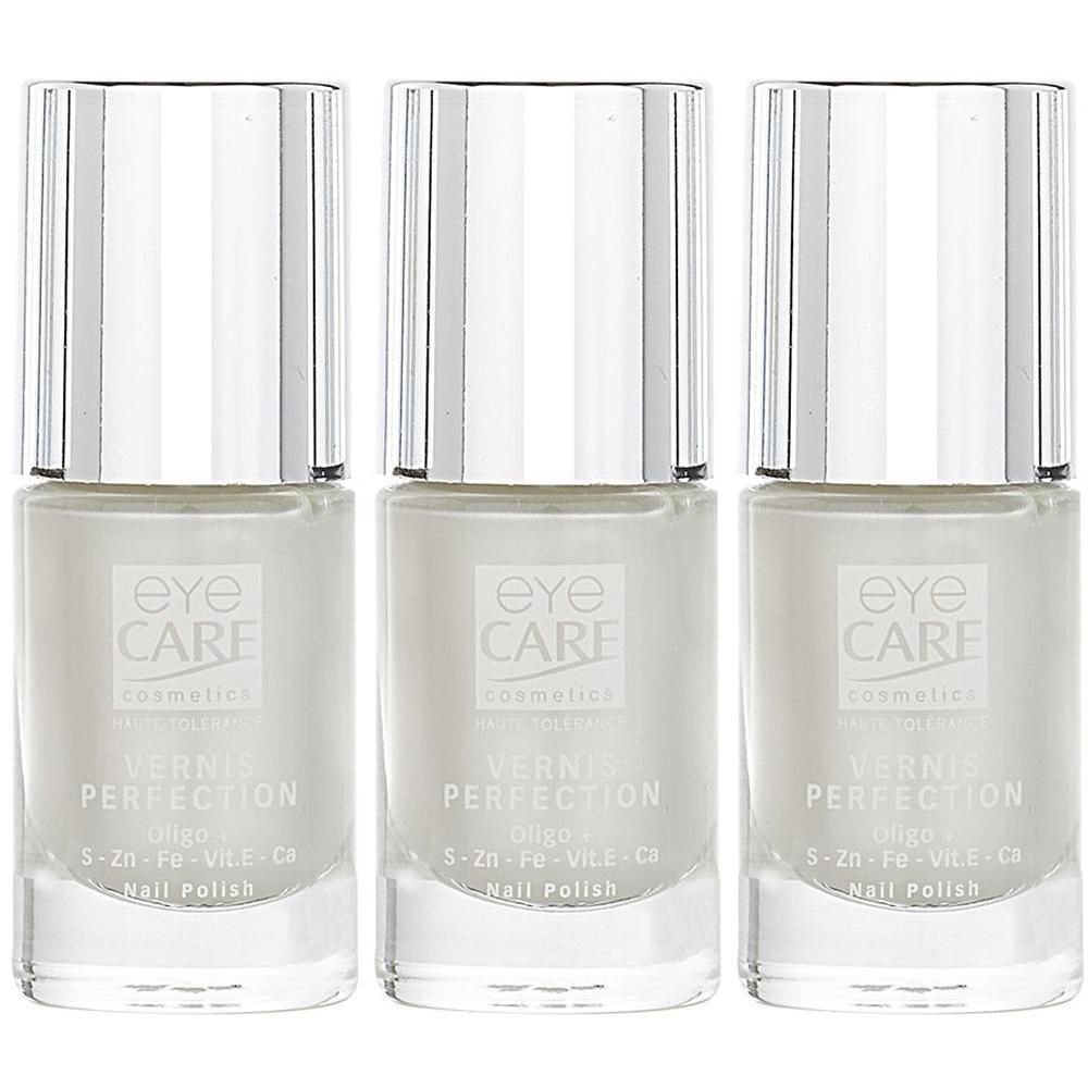Drie flacons Eye Care Vernis Perfection Nagellak Parelmoerwit. Zilverkleurige doppen.