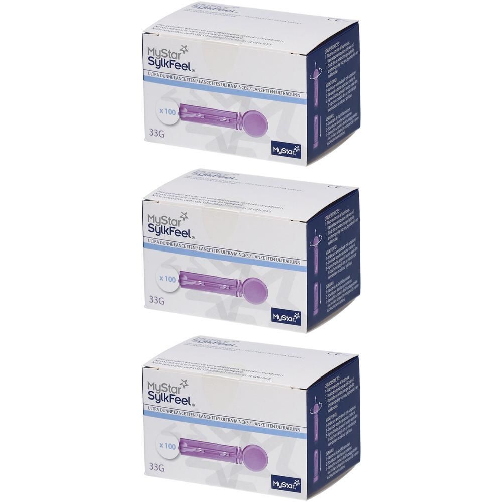 Trois boîtes Mystar SylkFeel 33G contenant 100 lancettes chacune. Lancettes violettes avec capuchon visibles.
