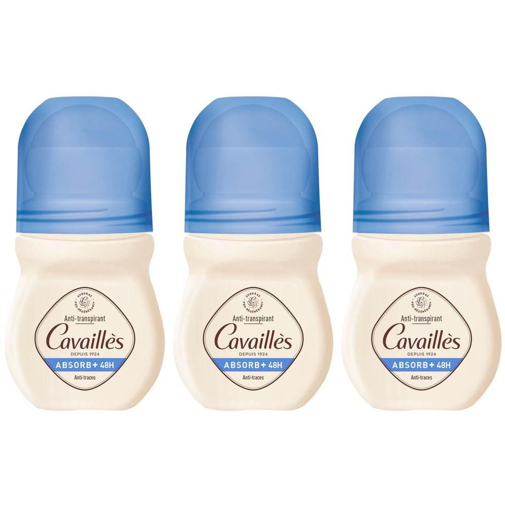 Trois déodorants roll-on Cavallès avec bouchons bleus et flacons beiges.