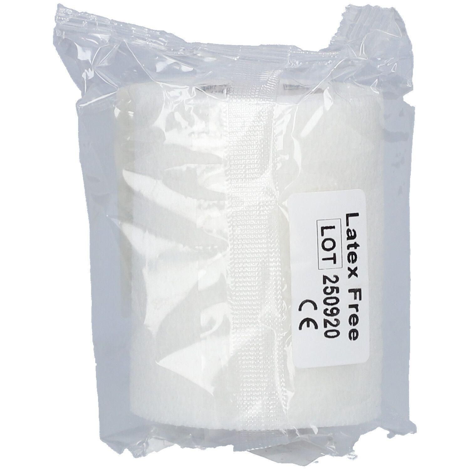 Bande adhésive blanche sans latex, emballage transparent. Marquage CE et numéro de lot visibles.