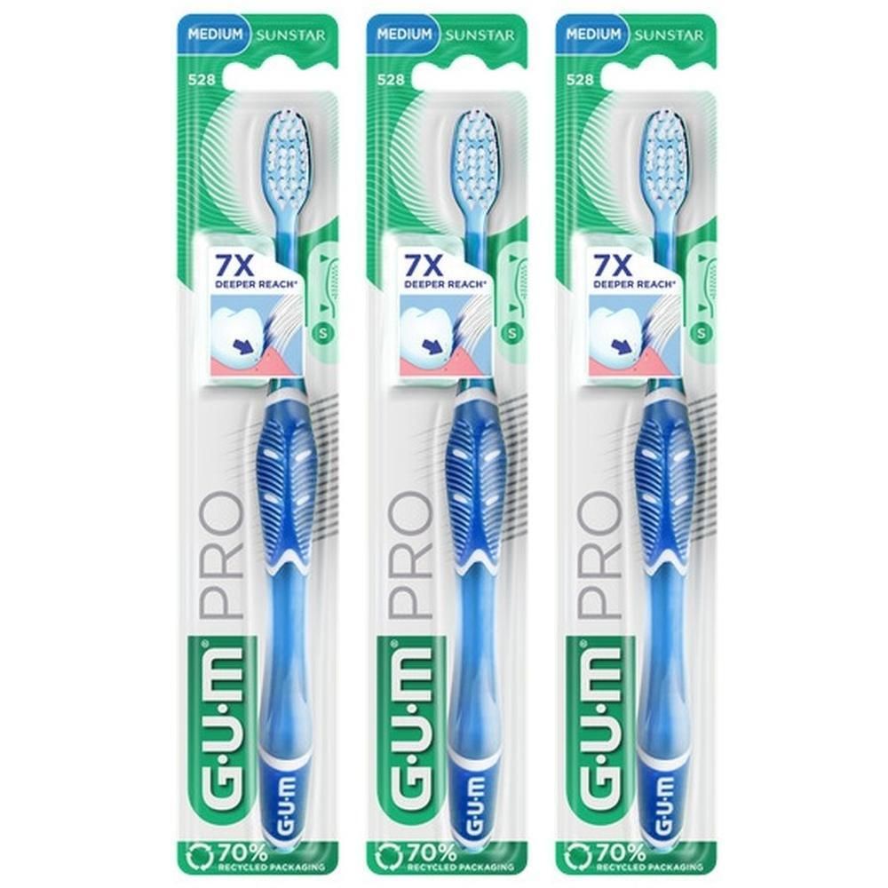 Drie GUM Technique Pro tandenborstels in een blisterverpakking.