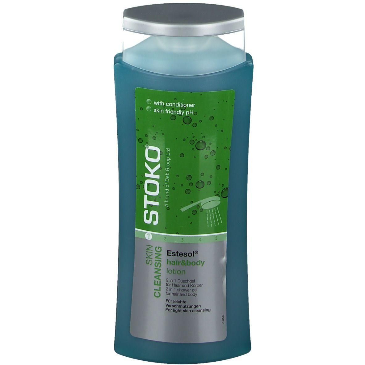 Flacon bleu de lotion pour cheveux et corps STOKO Estesol. pH respectueux de la peau.