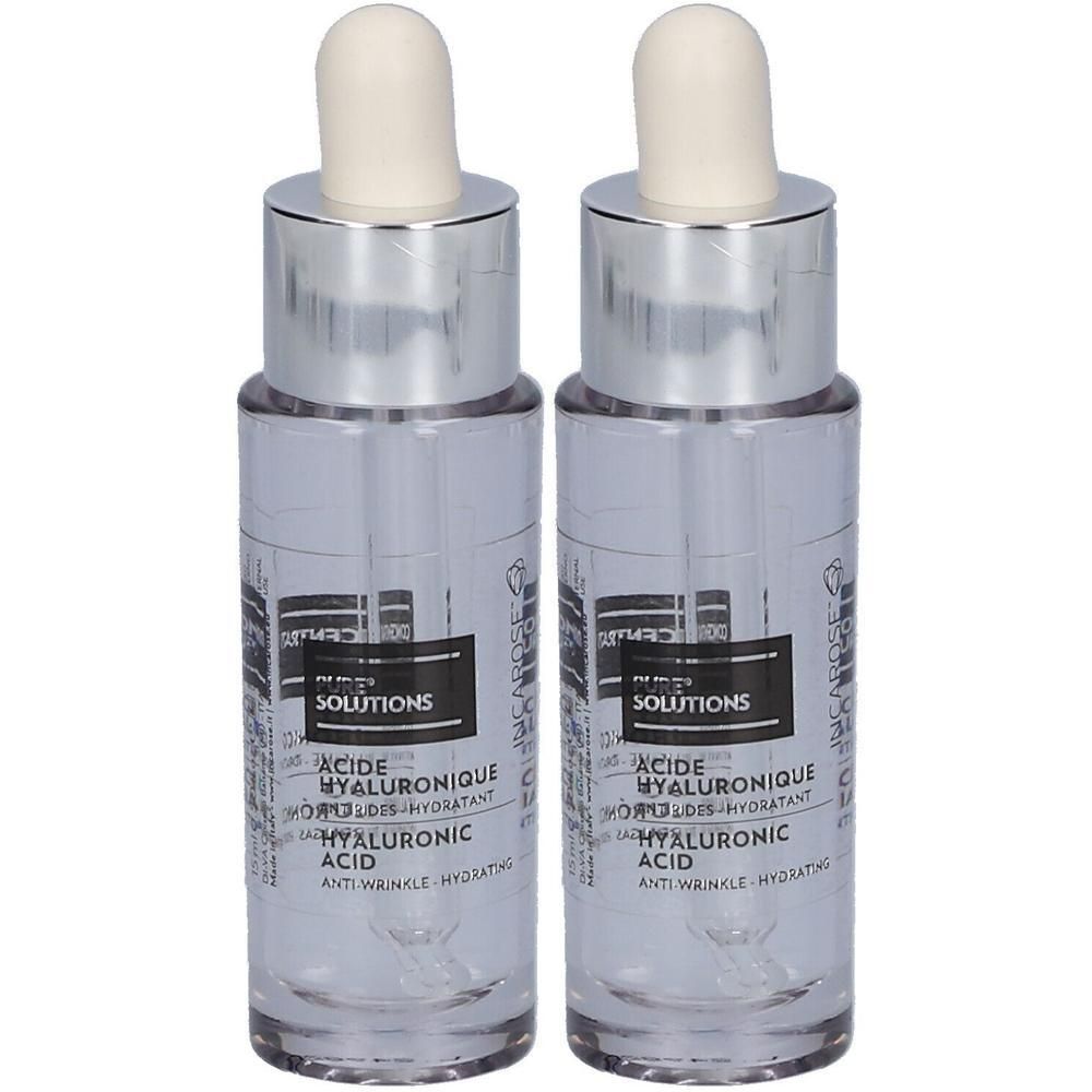 Deux flacons d'acide hyaluronique avec pipettes. Liquide clair dans des flacons transparents avec bouchons argentés.