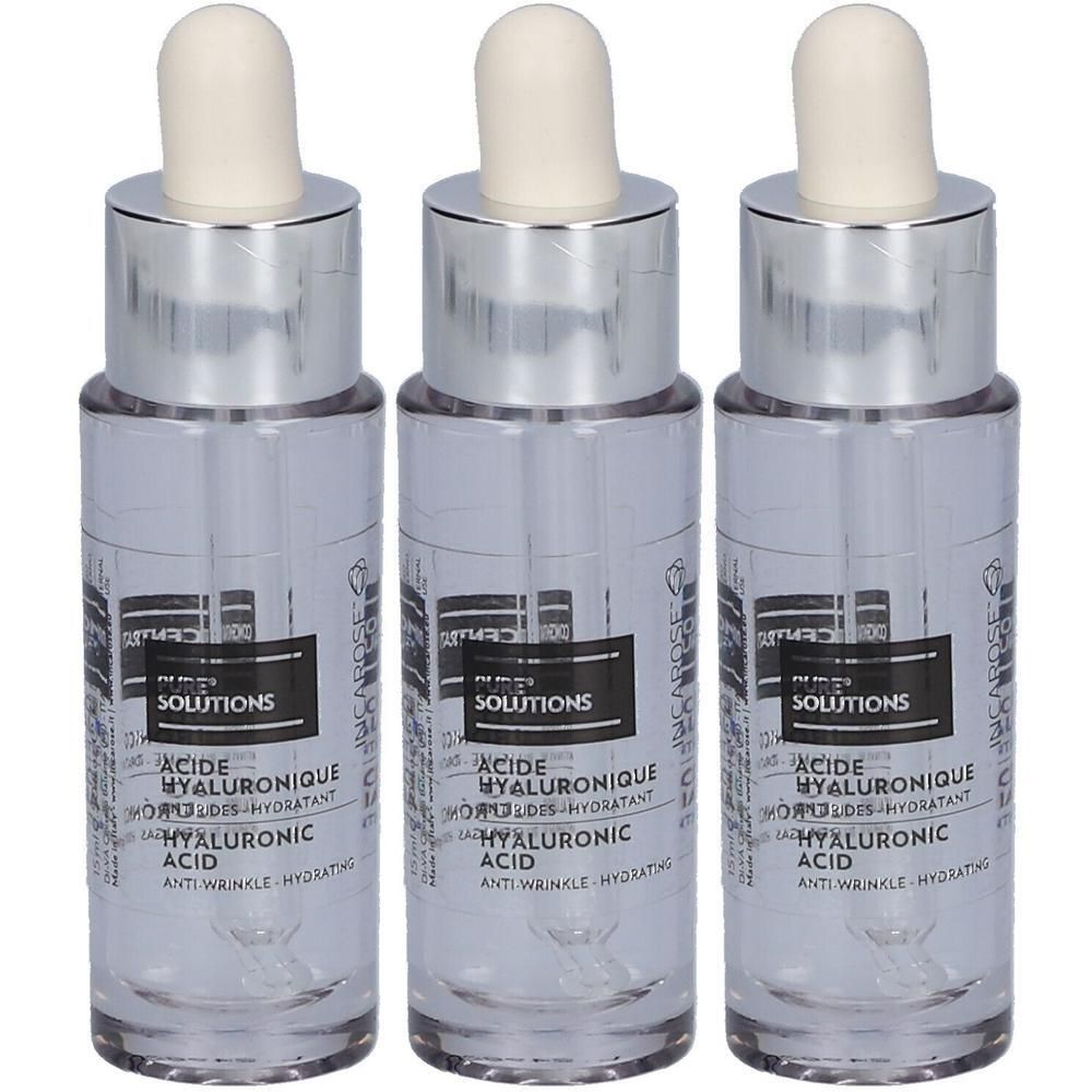 Trois flacons de sérum à l'acide hyaluronique avec compte-gouttes. Liquide clair dans des flacons transparents avec bouchons argentés.