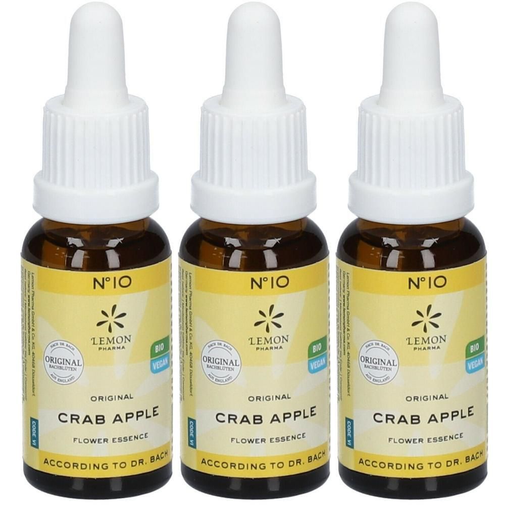 Drie glazen flesjes met druppelaar, geel etiket met tekst 'Crab Apple Flower Essence'.