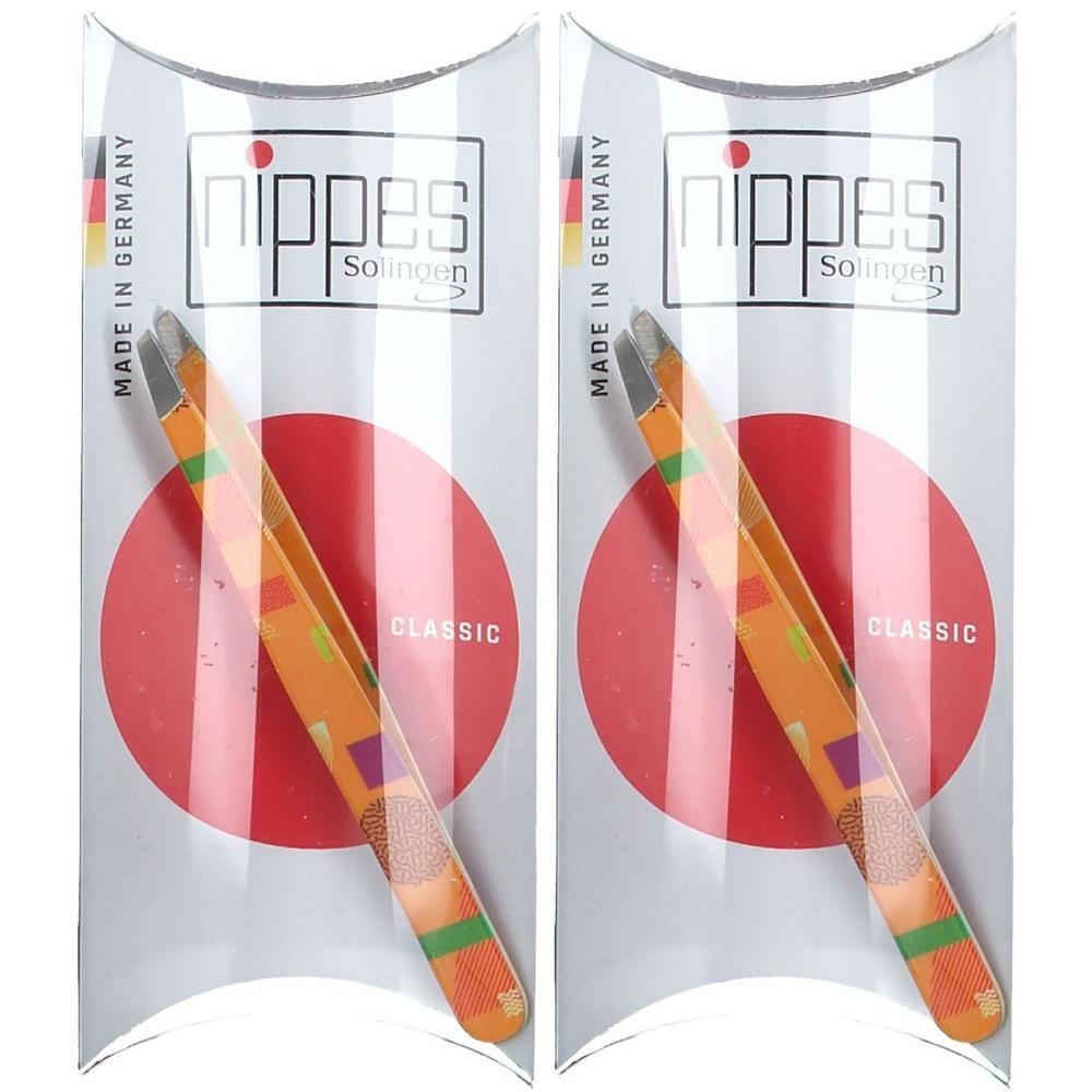 Twee oranje pincetten met geometrisch patroon in doorzichtige verpakking. Gemaakt in Duitsland.