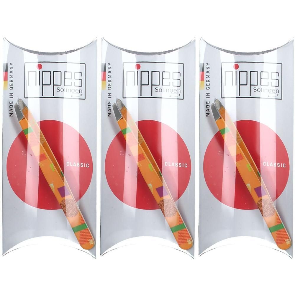 Drie oranje pincetten met geometrische patronen in blisterverpakking. "Nippes Solingen Classic" en "Made in Germany" zijn zichtbaar.