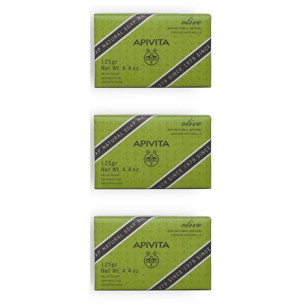 Trois paquets de savon Apivita à l'olive, 125g chacun. Emballage vert avec bande noire et texte.