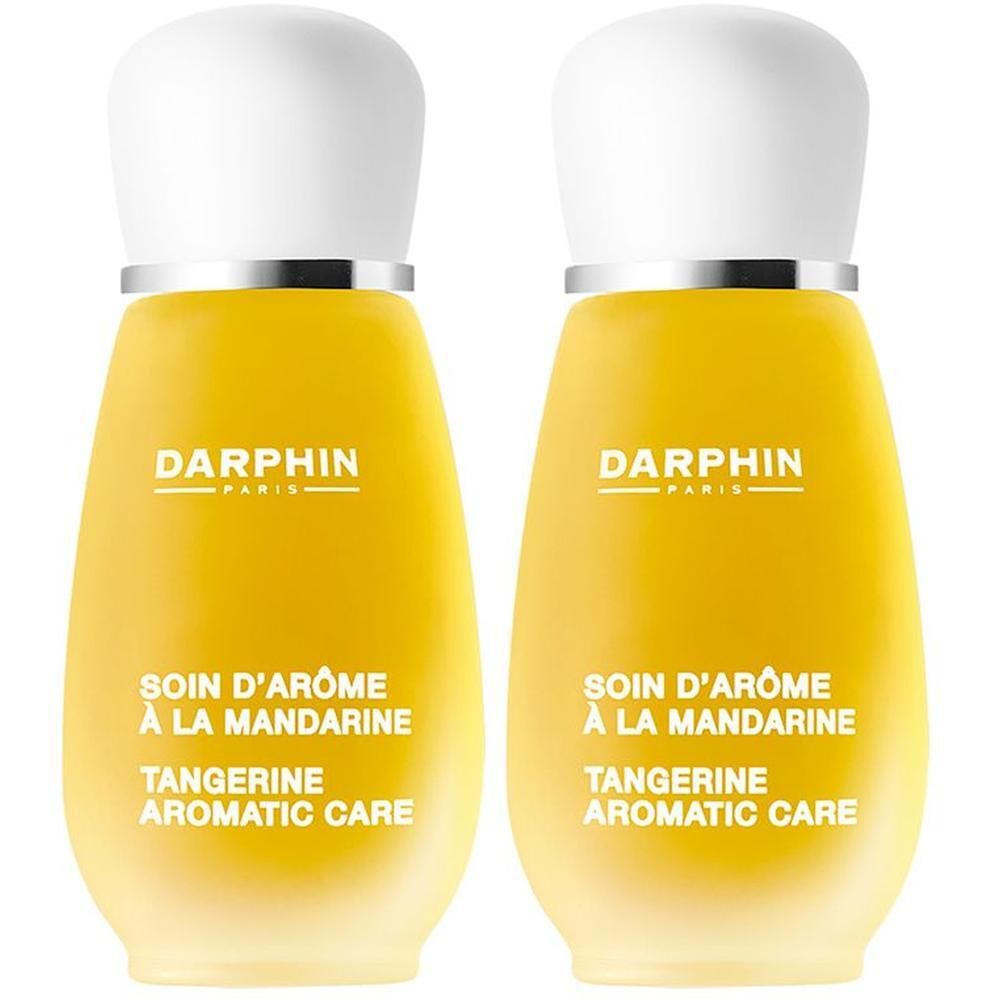 Deux flacons Darphin Soin D'Arôme À La Mandarine, bouchon blanc, anneau argenté. Verre jaune en forme de goutte.