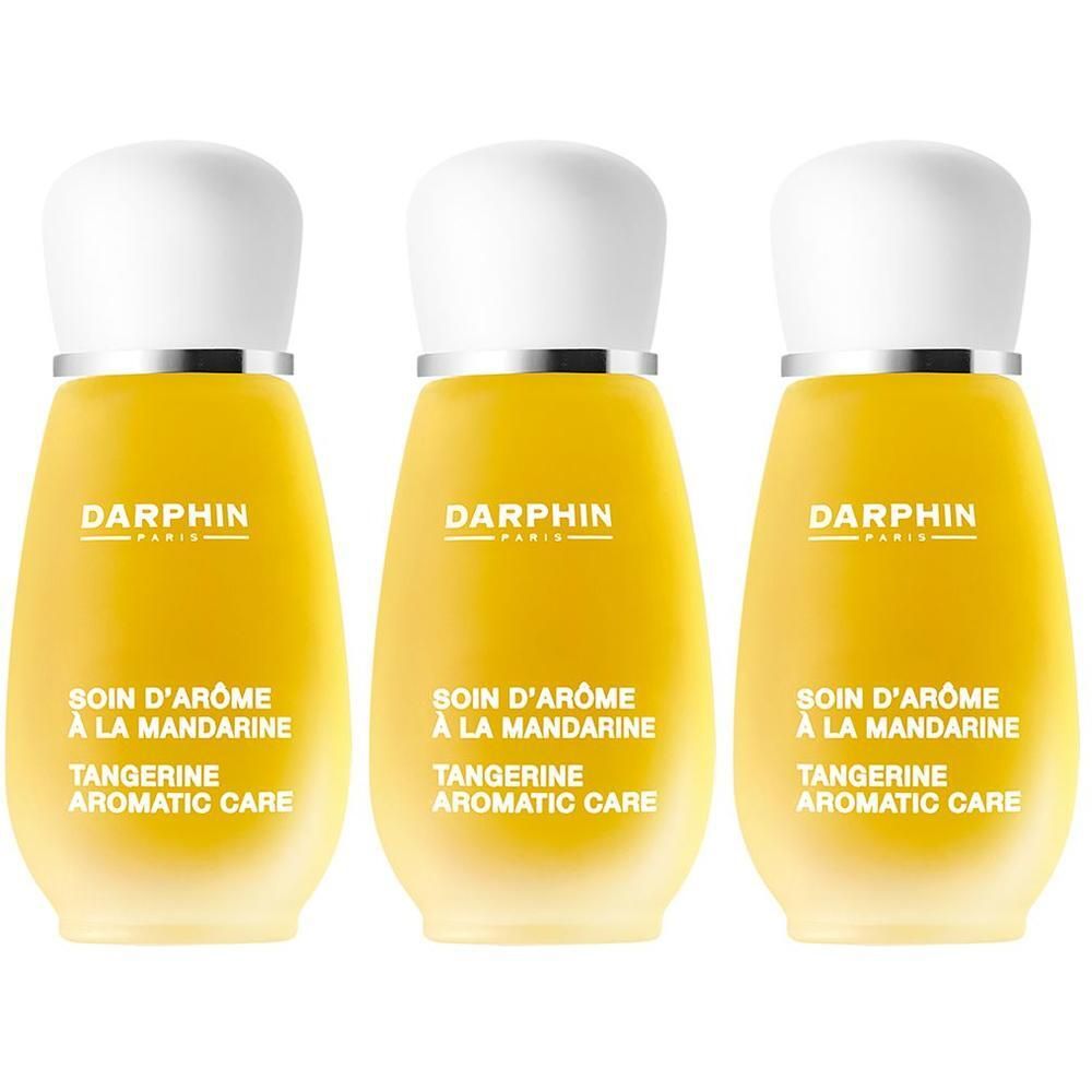 Trois flacons Darphin de Soin d'Arôme à la Mandarine. Liquide jaune dans un flacon en verre.