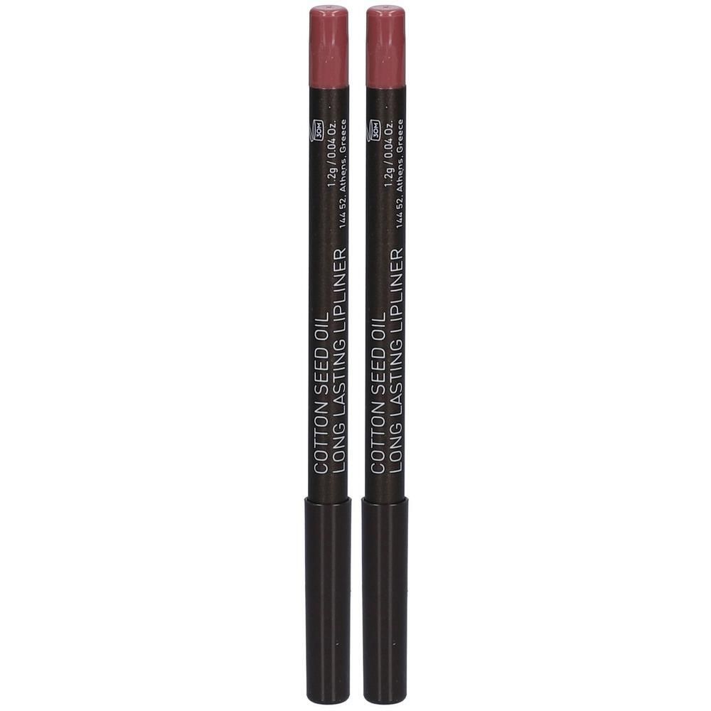 Deux crayons à lèvres d'une teinte rose poudré. Boîtiers noirs avec inscription argentée.