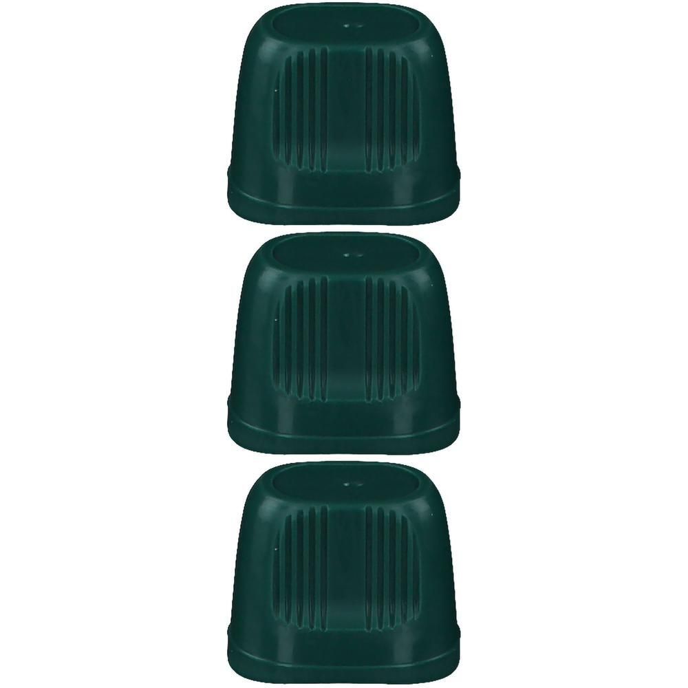 Drie groene plastic dopjes met verticale groeven.