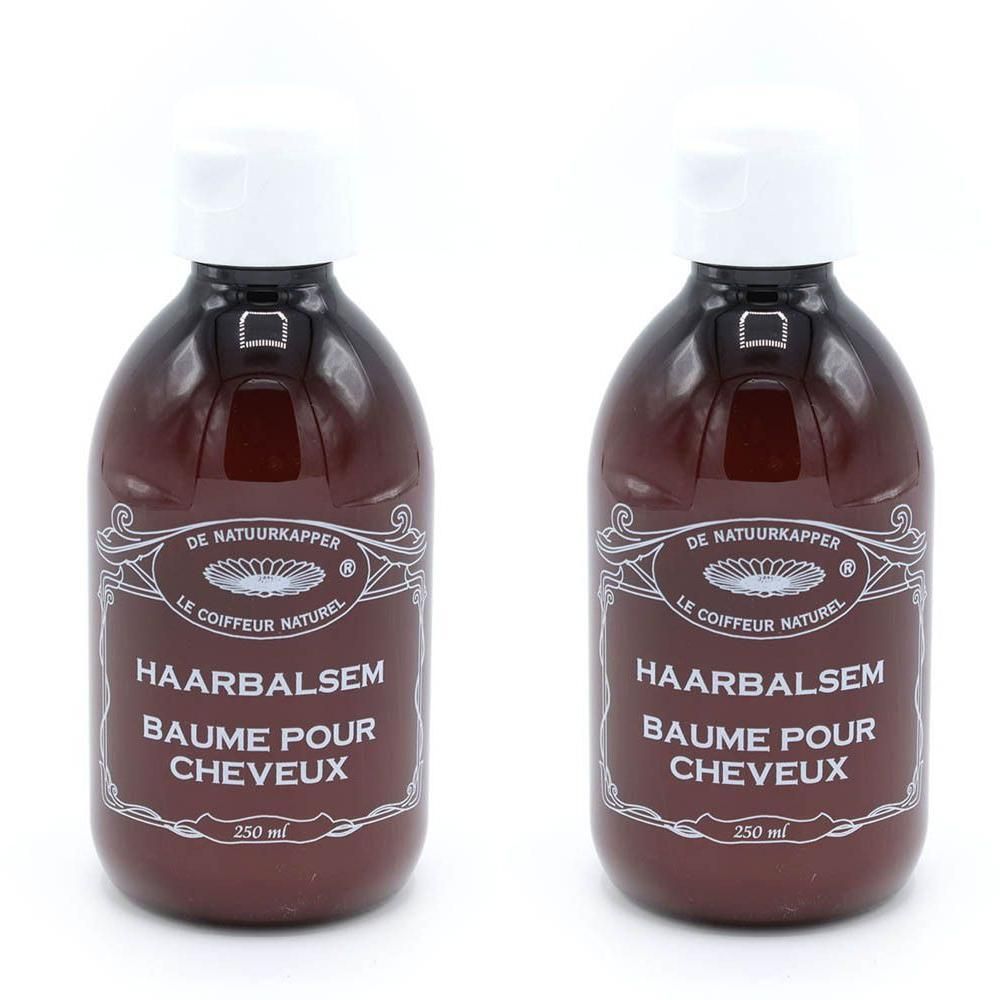 Deux flacons bruns à bouchon blanc, étiquetés 'Haarbalsem Baume pour Cheveux'.