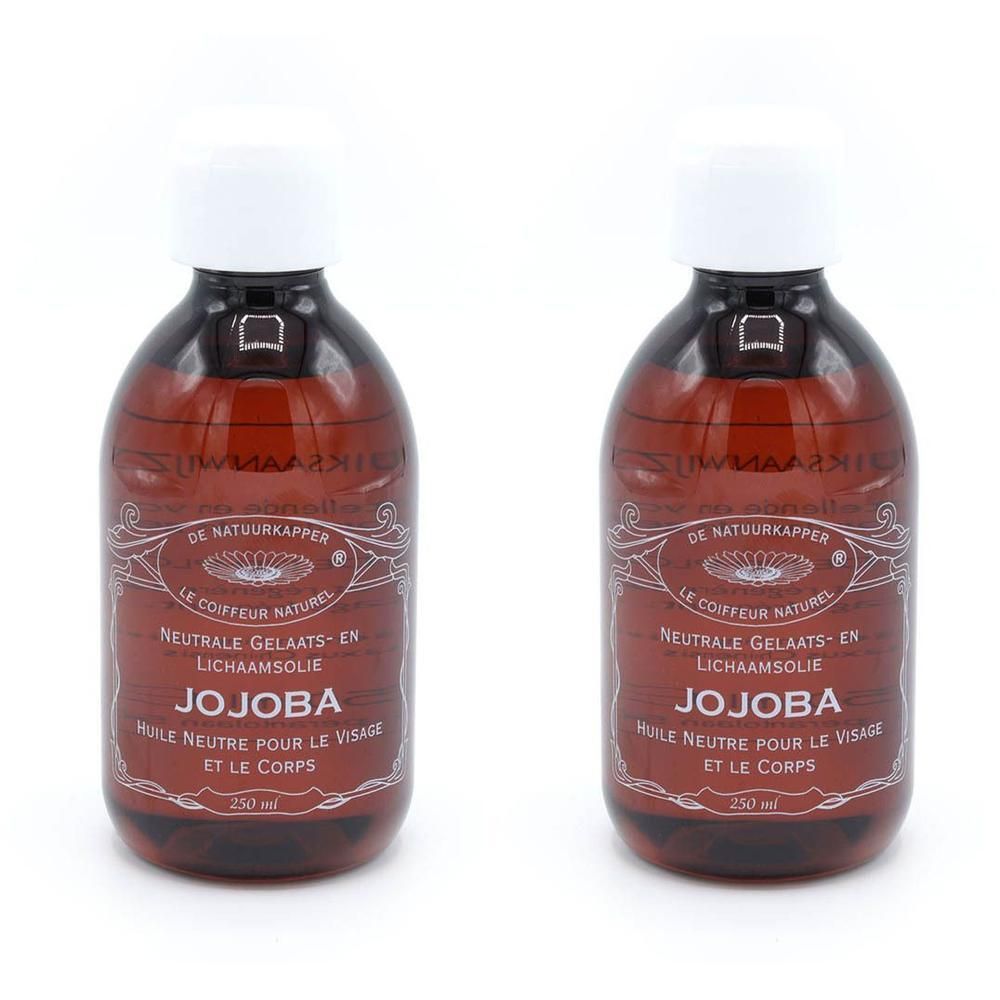 Deux bouteilles d'huile de jojoba avec bouchon blanc. Bouteilles en verre brun avec étiquette.