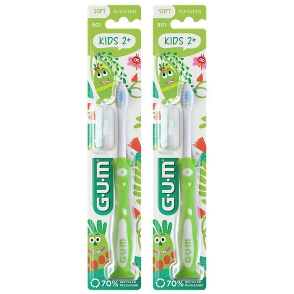 Deux brosses à dents GUM Kids en emballage double, souples, avec manches verts et design monstre.