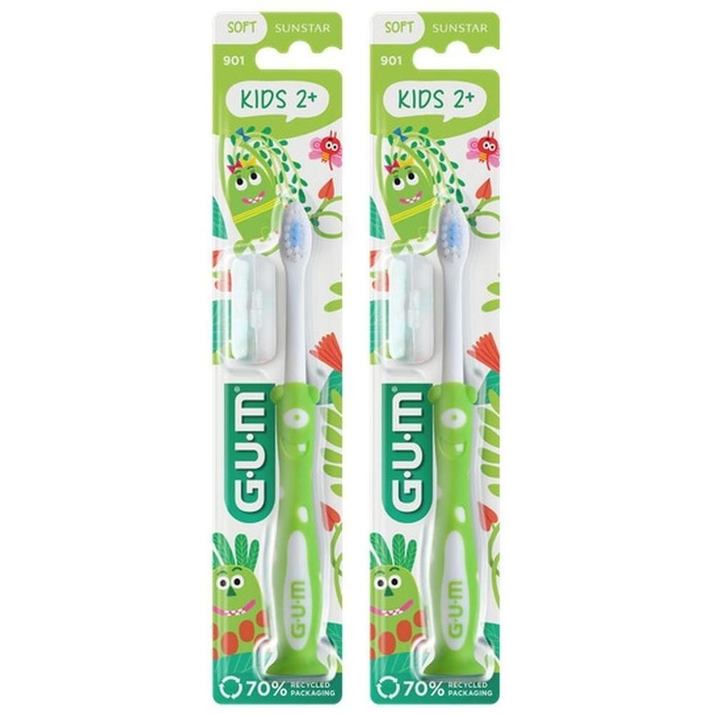 Twee GUM Kids tandenborstels in dubbelverpakking, zacht, met groene handvatten en monsterdesign.