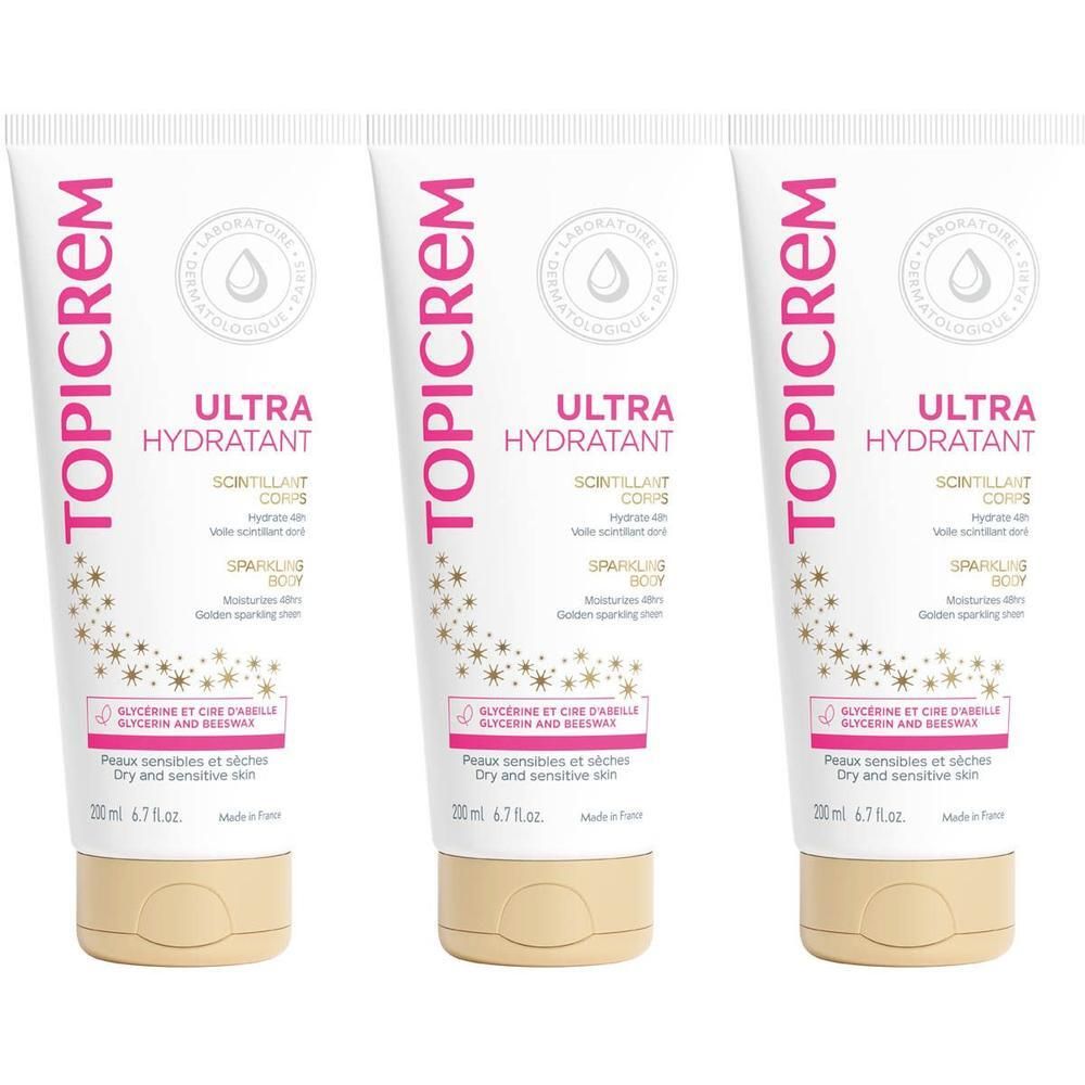 Drie tubes Topicrem Ultra Hydratant bodycrème met glinsterend effect.