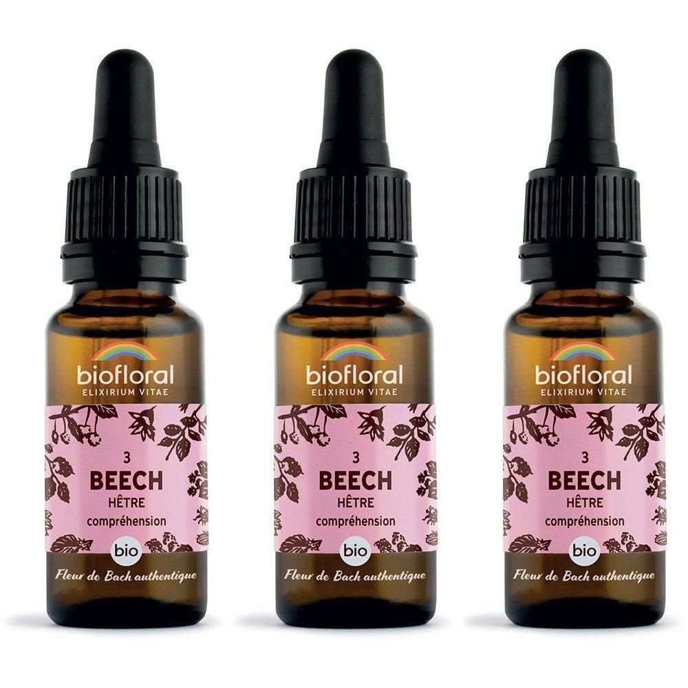 Trois flacons en verre avec compte-gouttes, marron, étiquette rose avec motif hêtre.