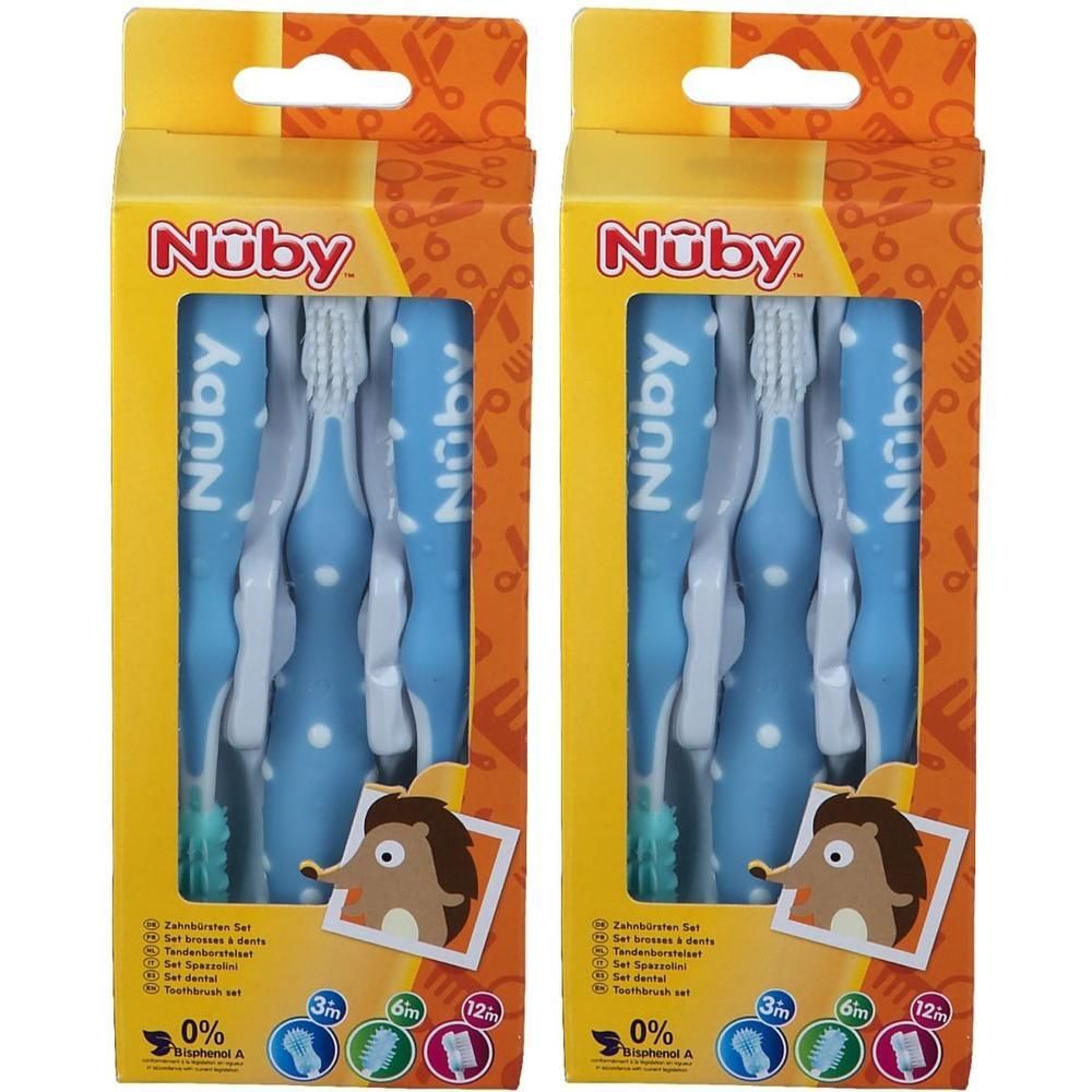 Deux paquets de sets de brosses à dents Nuby pour bébés, bleus à pois blancs, avec motif hérisson.