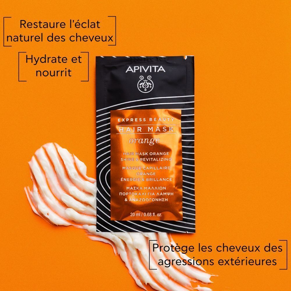 Sachet de masque capillaire Apivita Express Beauty Orange avec tranche d'orange.