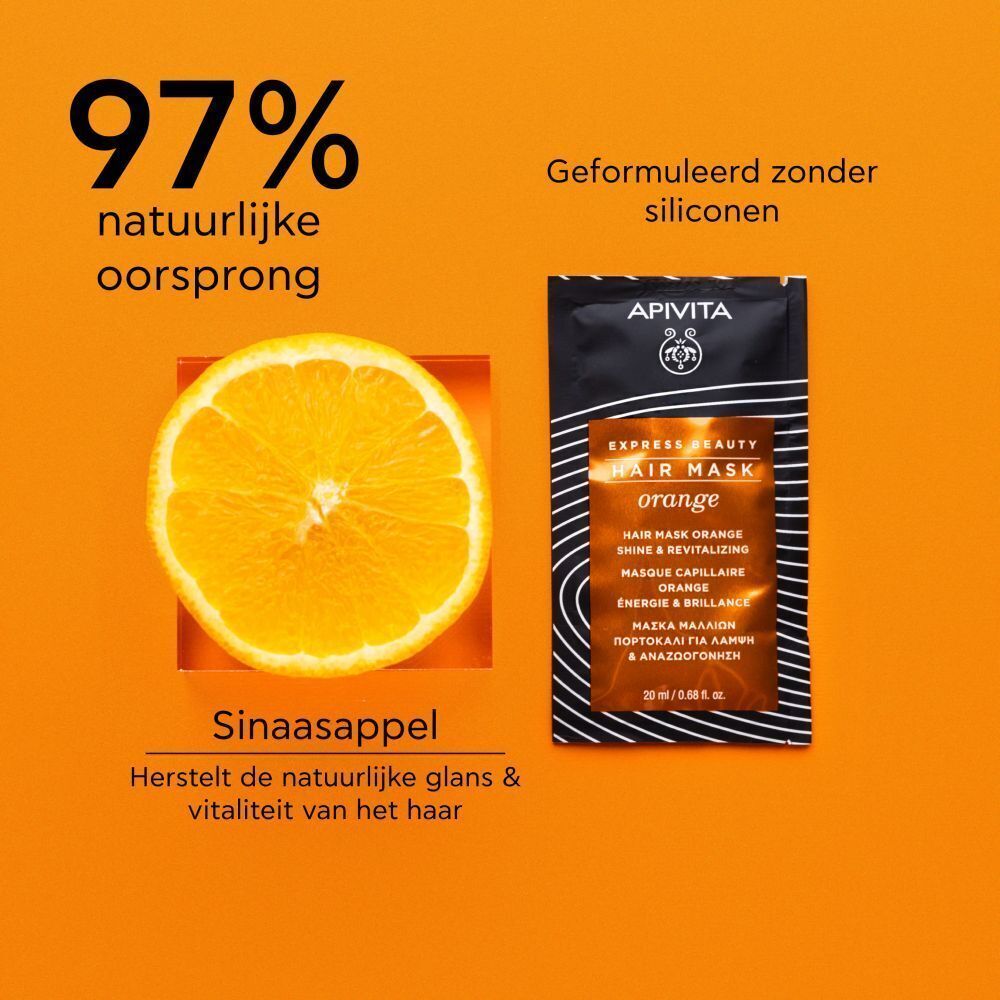 Sachet Apivita Express Beauty Orange haarmasker met sinaasappelschijf.