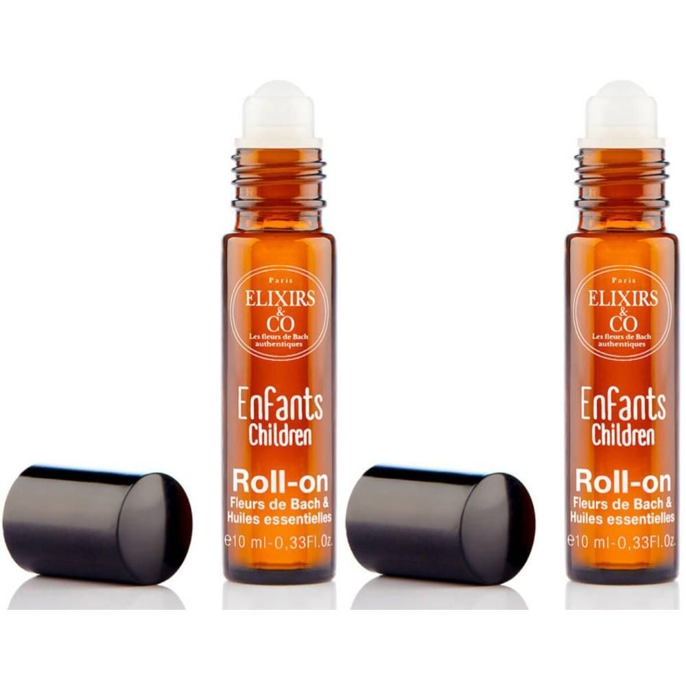 Deux flacons roll-on avec bouchon. Verre brun, étiquette avec 'Enfants Children Roll-on'.