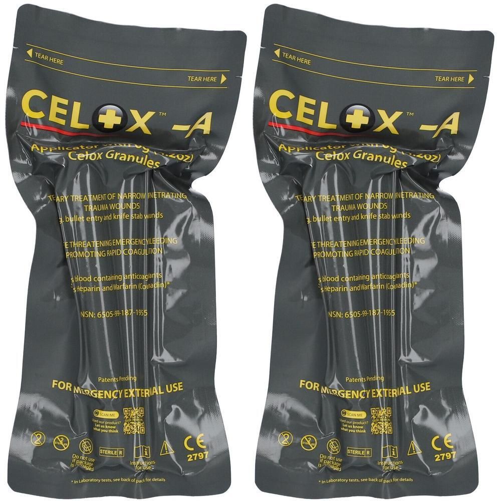 Deux applicateurs Celox-A avec granulés pour usage d'urgence. Emballage sombre avec inscription jaune.