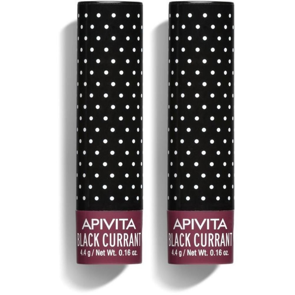 Twee lippenbalsemsticks, zwarte verpakking met witte stippen. 4,4 g.