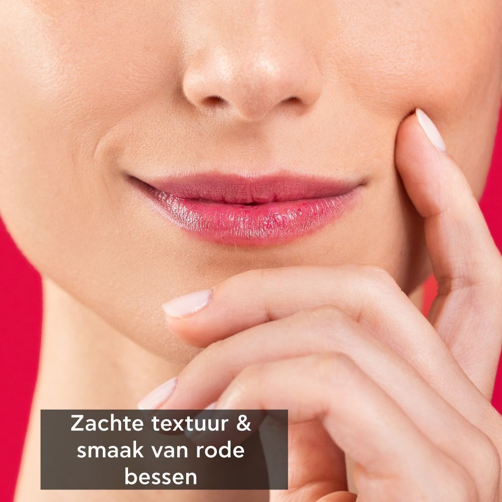 Close-up van lippen met een lichte roodroze gloed.