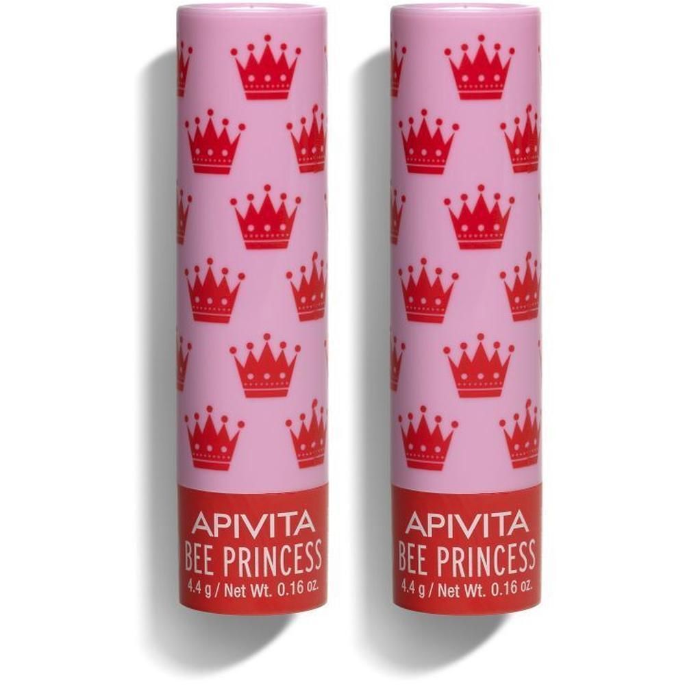 Deux tubes de baume à lèvres avec un étui rose à couronnes rouges.