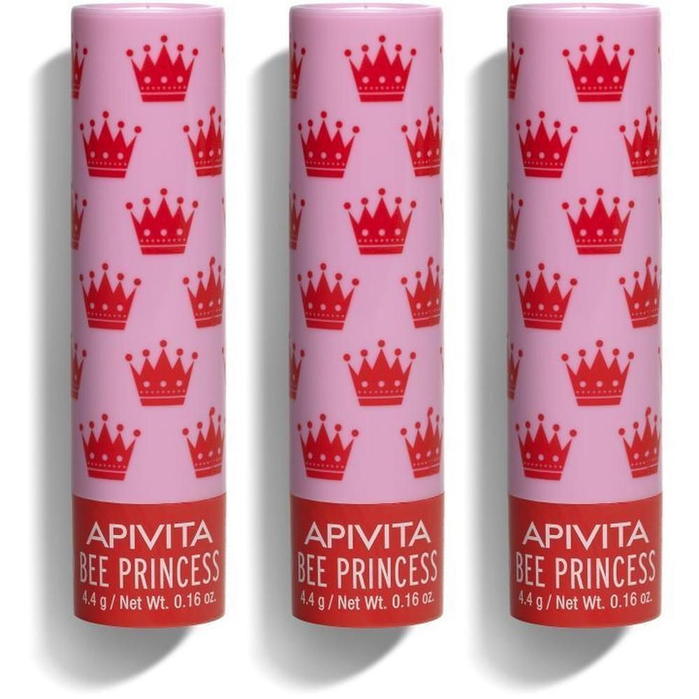 Trois tubes de baume à lèvres avec un motif de couronnes roses.