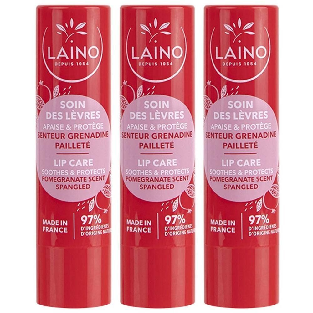 Drie rode lippenbalsems met wit etiket en granaatappel-design.