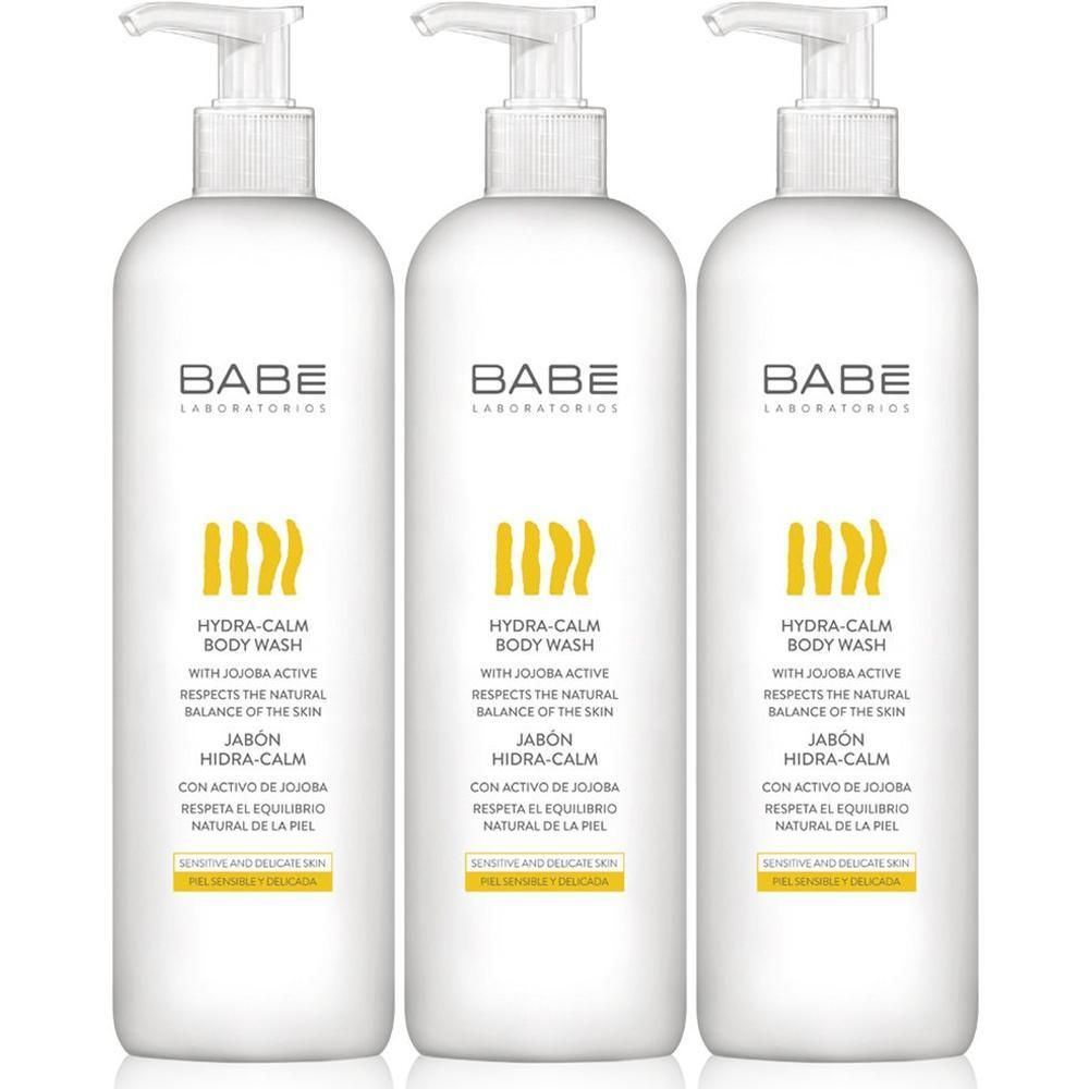 Trois flacons pompe blancs de BABÉ Hydra-Calm Body Wash.