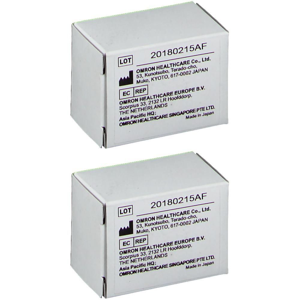 Deux boîtes blanches avec informations produit et numéro de lot.