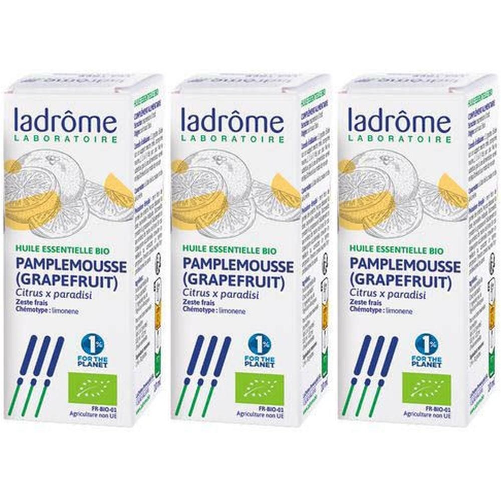 Drie doosjes Ladrôme etherische grapefruitolie. Met grapefruitillustraties en bio-keurmerk.