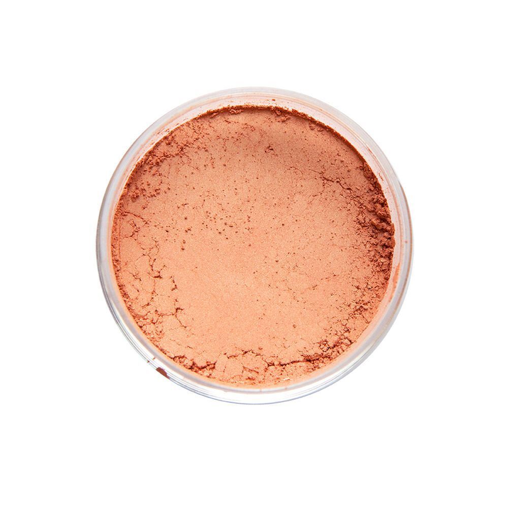 Potje los minerale blush in koraalkleur, bovenaanzicht.