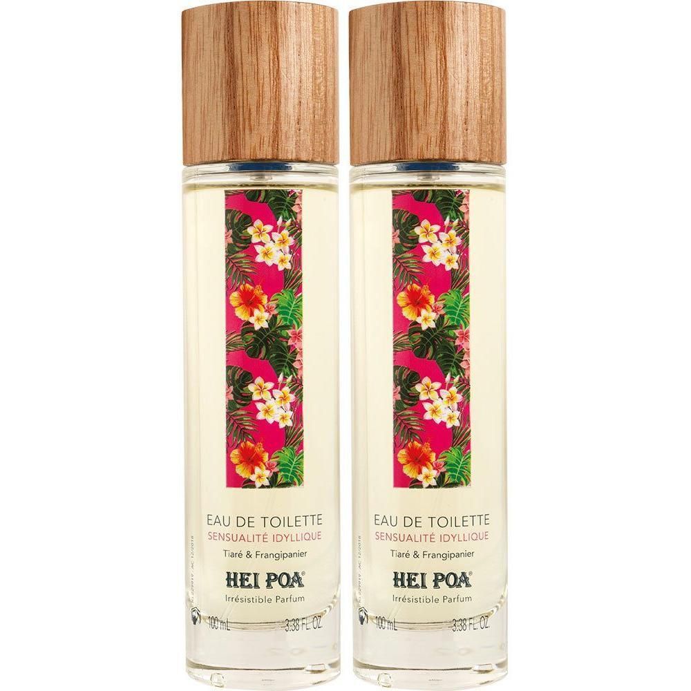 Twee flessen Eau de Toilette met tropisch bloemenpatroon en houten dopjes.