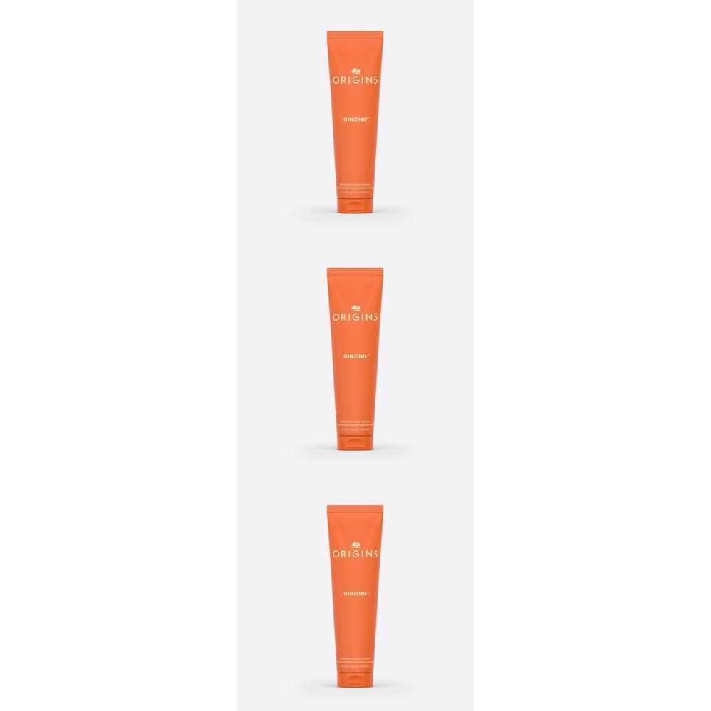 Trois tubes orange portant le logo Origins et le nom du produit.