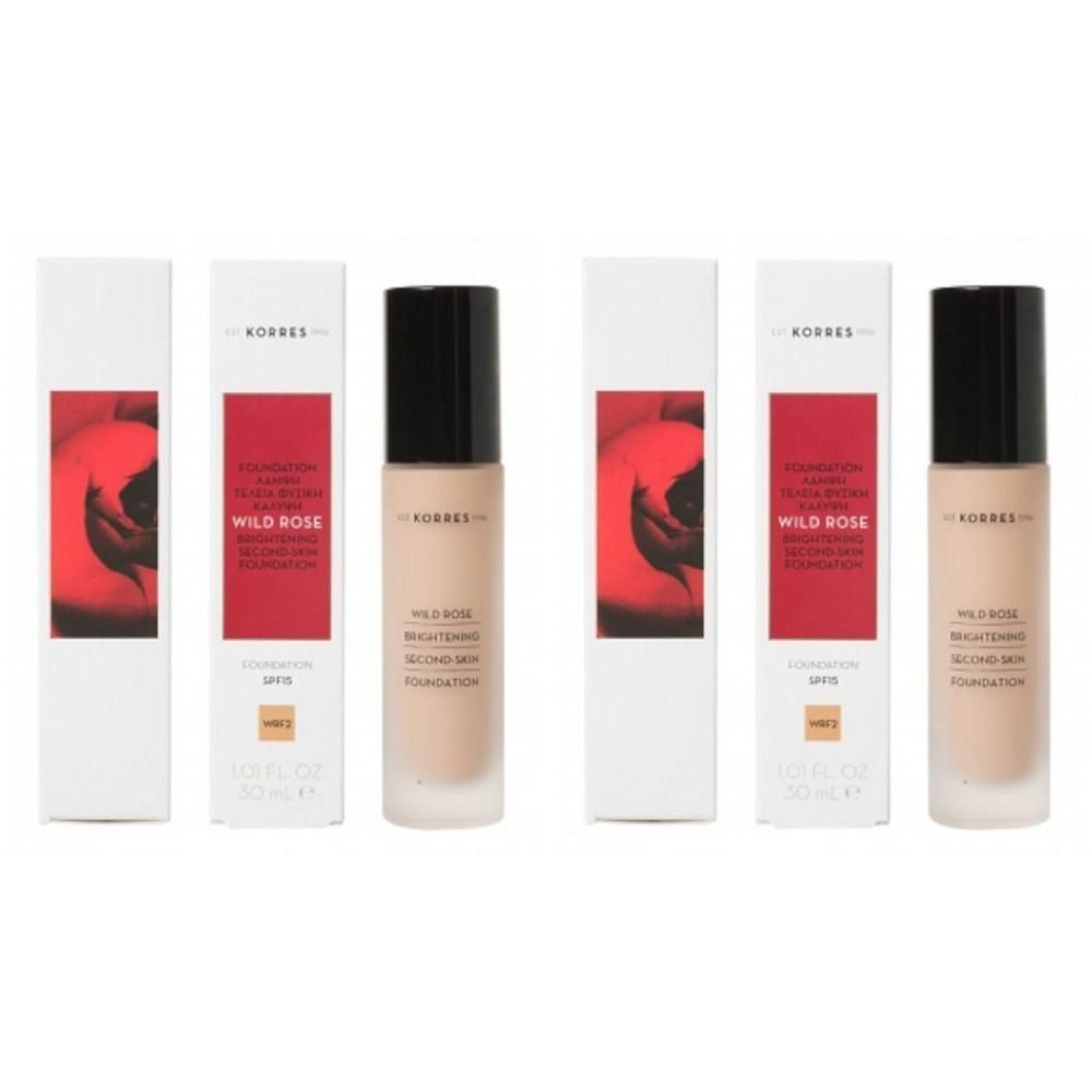 Trois flacons de fond de teint Korres Wild Rose avec emballage. Chaque flacon contient 30 ml.