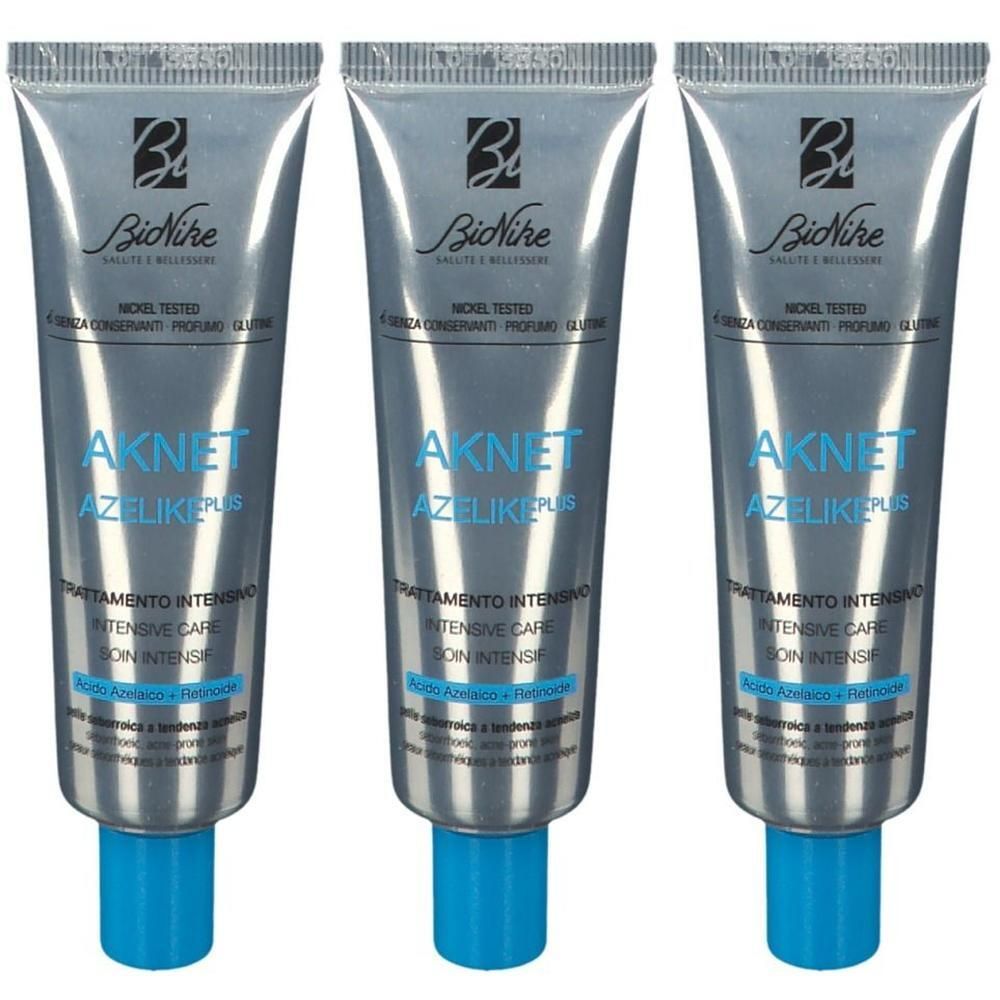 Trois tubes de BioNike Aknet Azelike Plus Soin Intensif avec bouchon bleu.