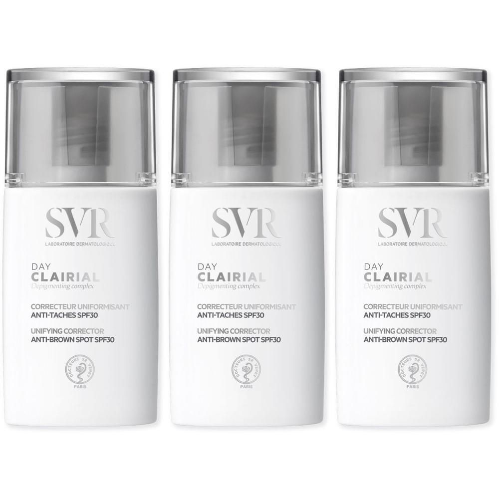 Drie flacons SVR Clairial Day SPF30, witte behuizing, zilveren dop.