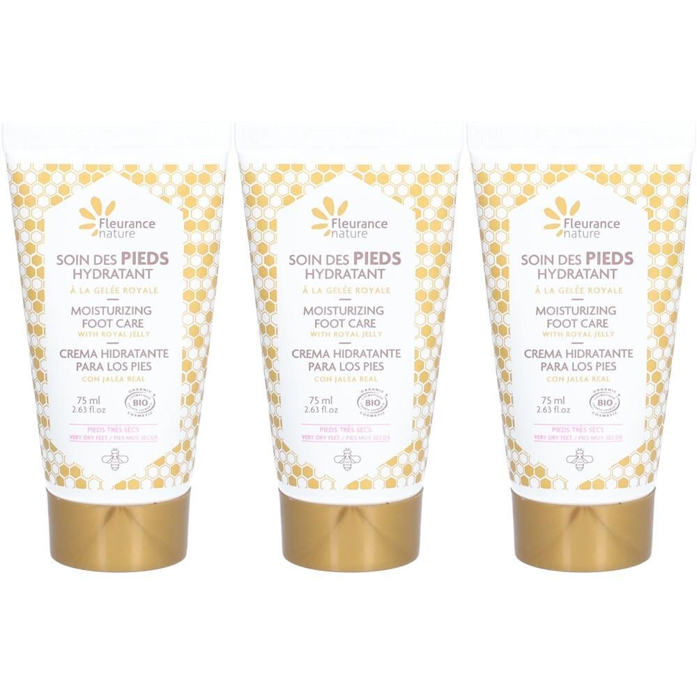 Trois tubes de crème hydratante pour les pieds Fleurance Nature à la Gelée Royale. Blanc et or, motif alvéolé.