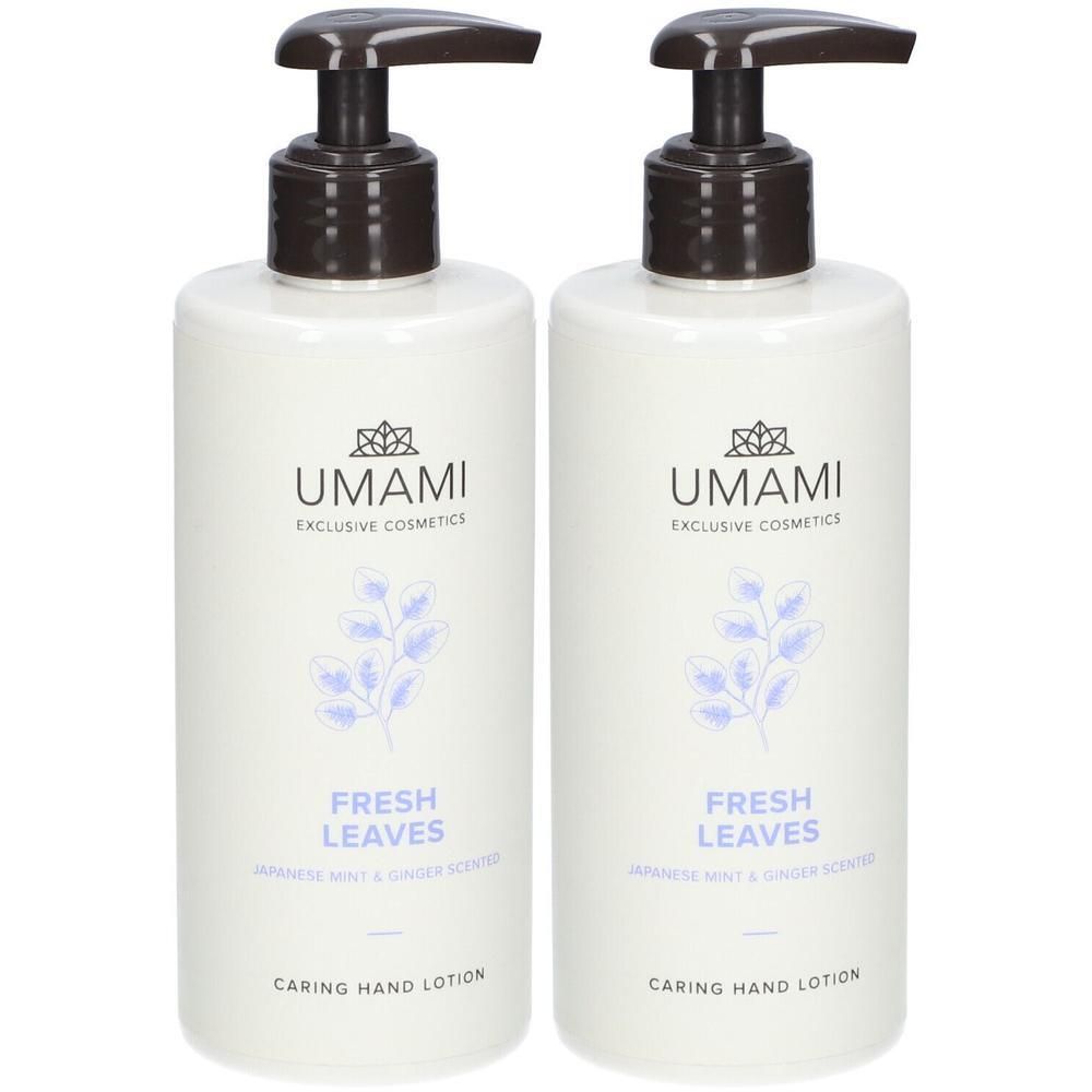 Deux flacons de lotion pour les mains UMAMI avec distributeurs à pompe. Flacons blancs avec motif de feuilles bleues et texte.