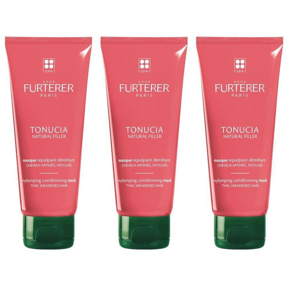 Drie René Furterer Tonucia Natural Filler maskers in roze tubes met groene doppen.