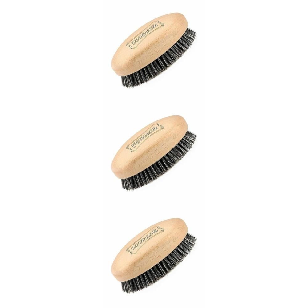 Trois brosses en bois à poils foncés, manche ovale avec inscription.