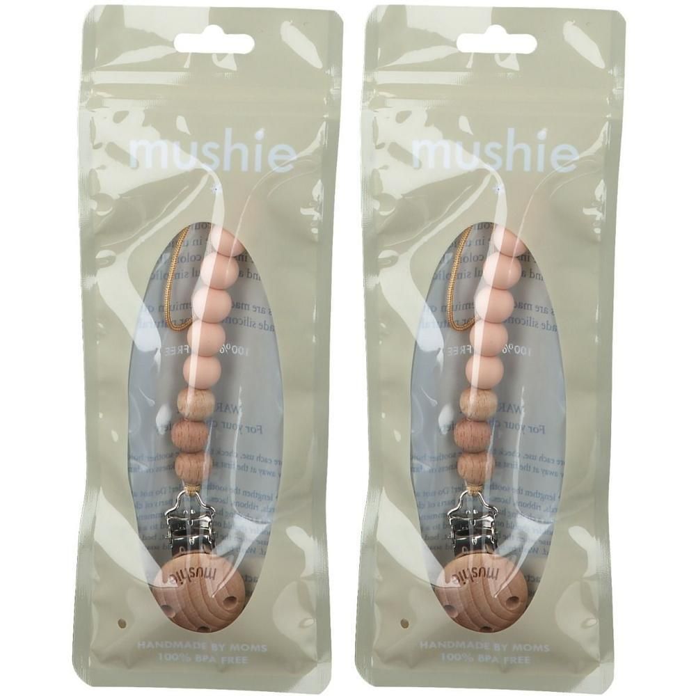 Deux attaches-sucette avec perles en bois rose et un clip en bois. Marque : Mushie.