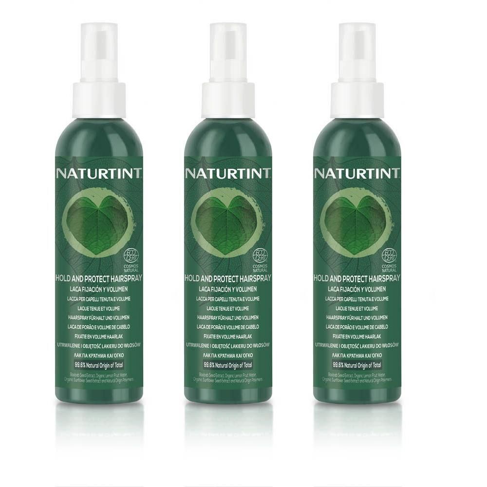 Drie groene Naturtint Haarspray spuitflessen met bladmotief en ECO-zegel.