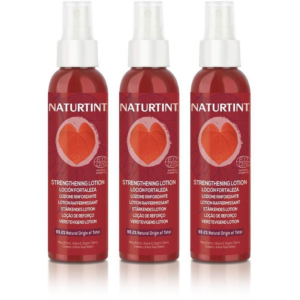 Drie flacons Naturtint Versterkende Lotion met rood hart-symbool en bio-certificering.